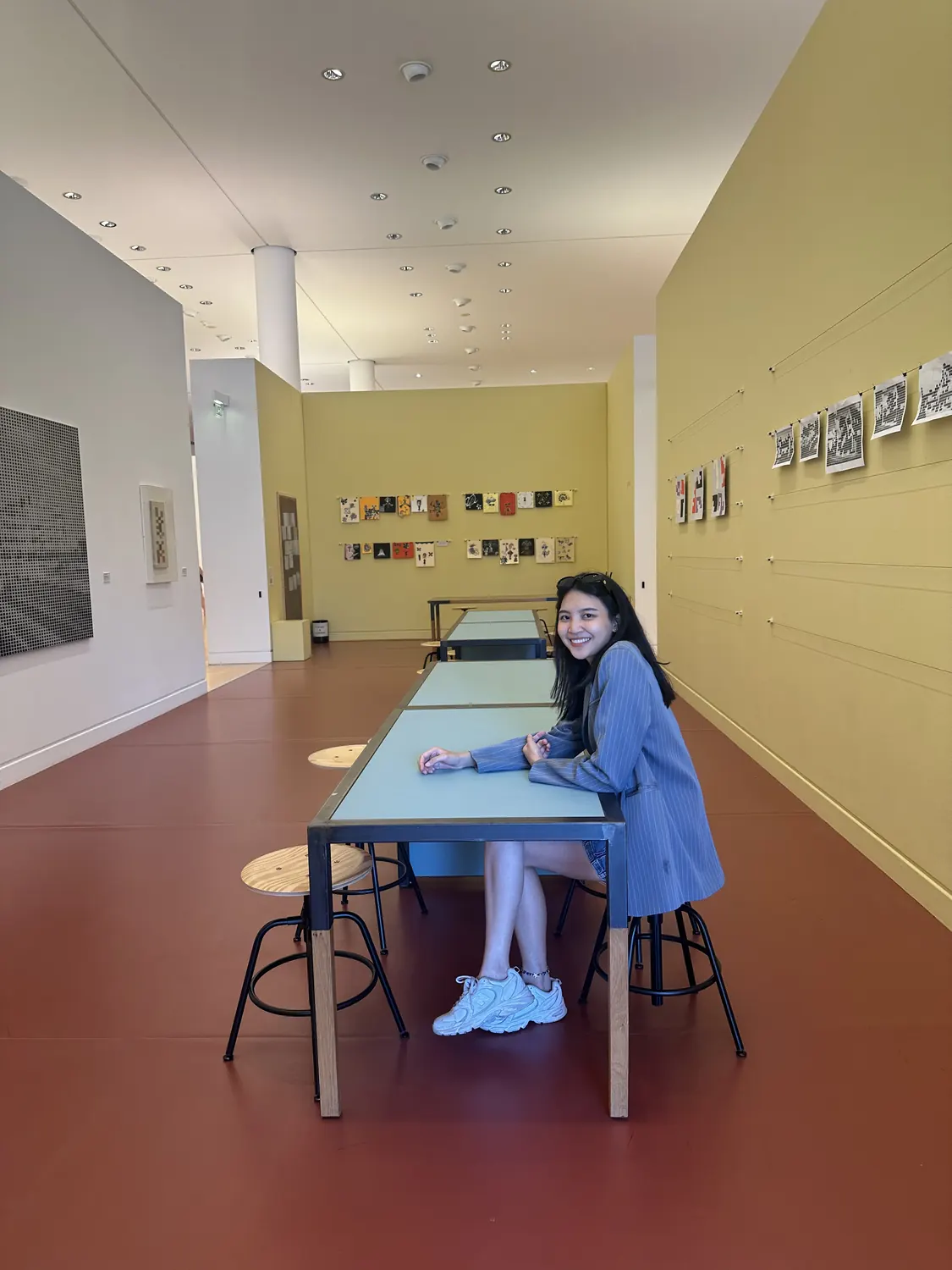 Reading room in a yellow gallery